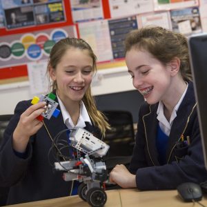 girls creating a robot